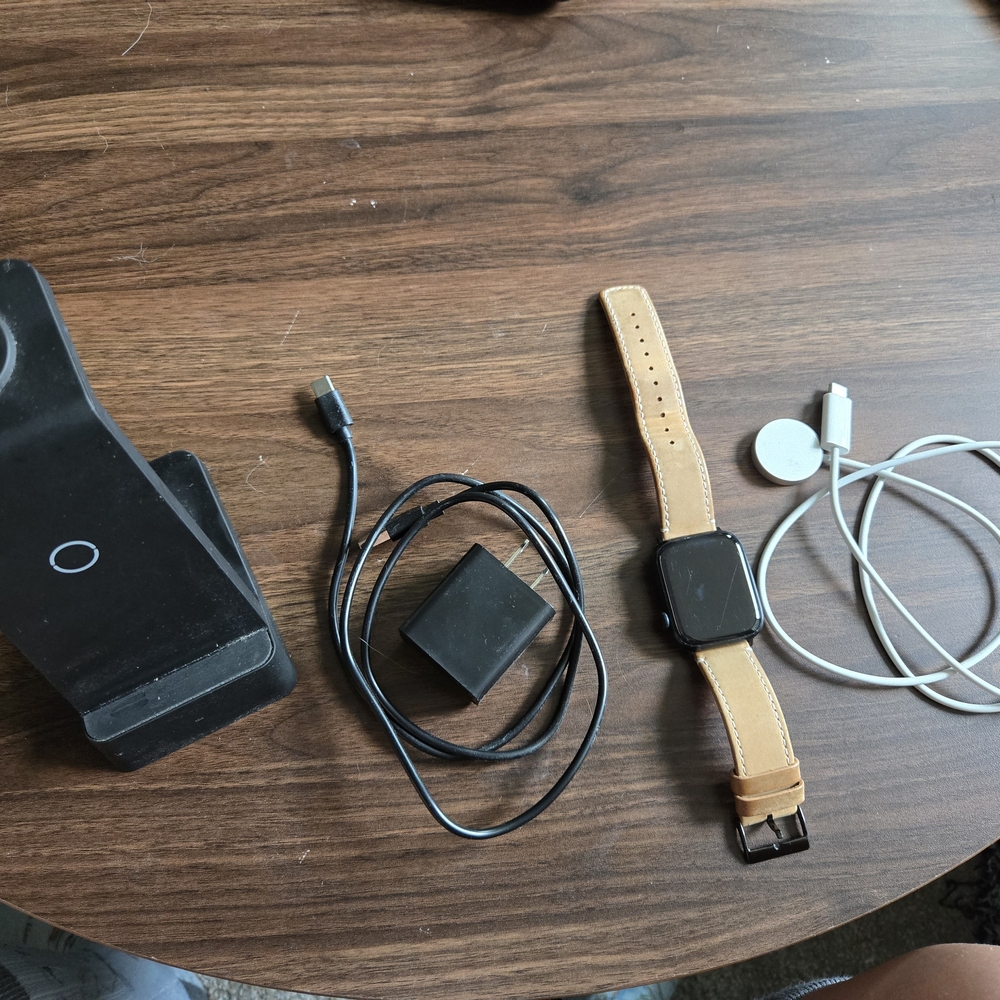 Apple Smartwatch with Tan Band and Accessories